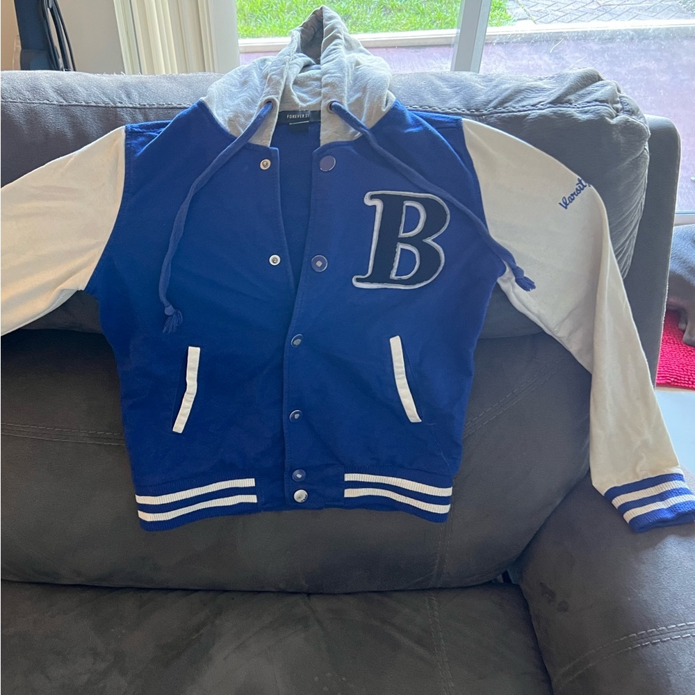 Blue and white letterman hoodie.